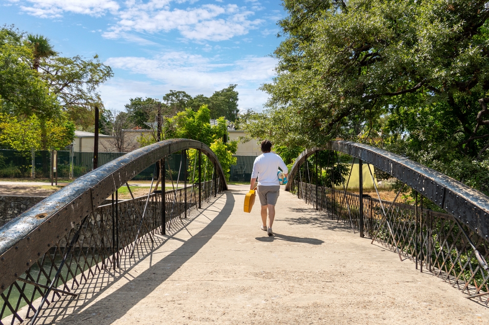 A,Man,Walking,On,A,Bridge